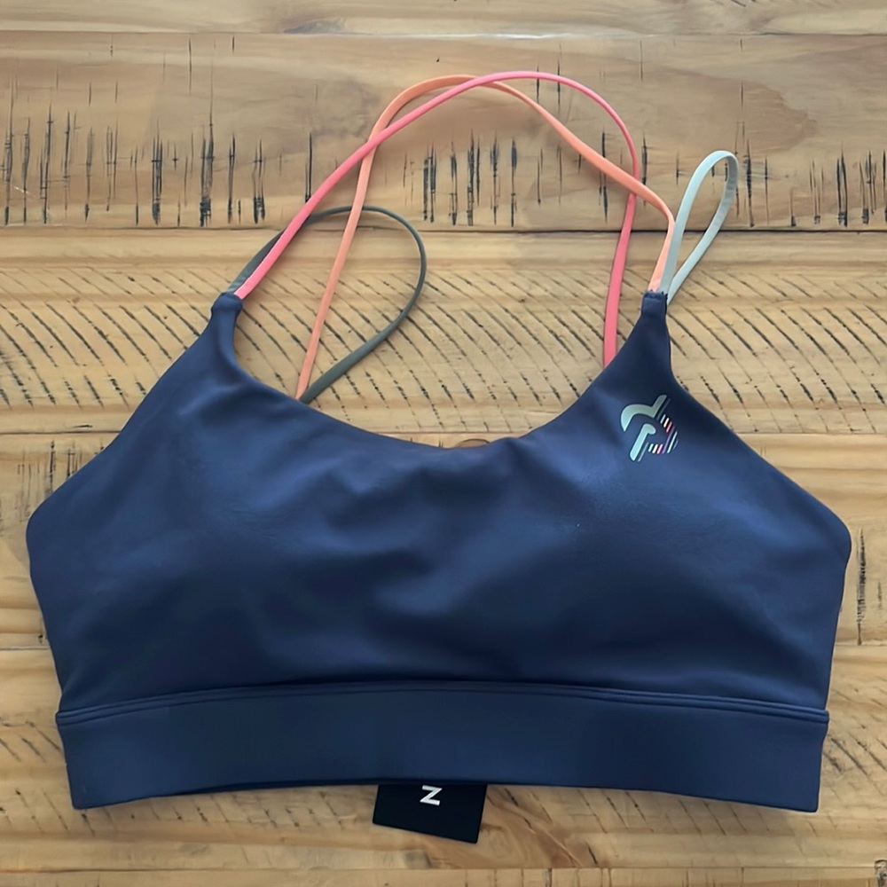 Peloton Speed Up Bra, navy blue and colorful straps